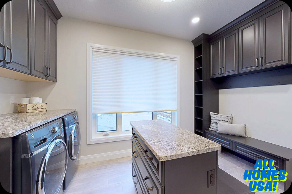 Spacious laundry room with dark cabinets, granite countertops, washer and dryer. A bench with cushions is under a bright window with blinds. Cozy and organized. Image for illustrative purpose.