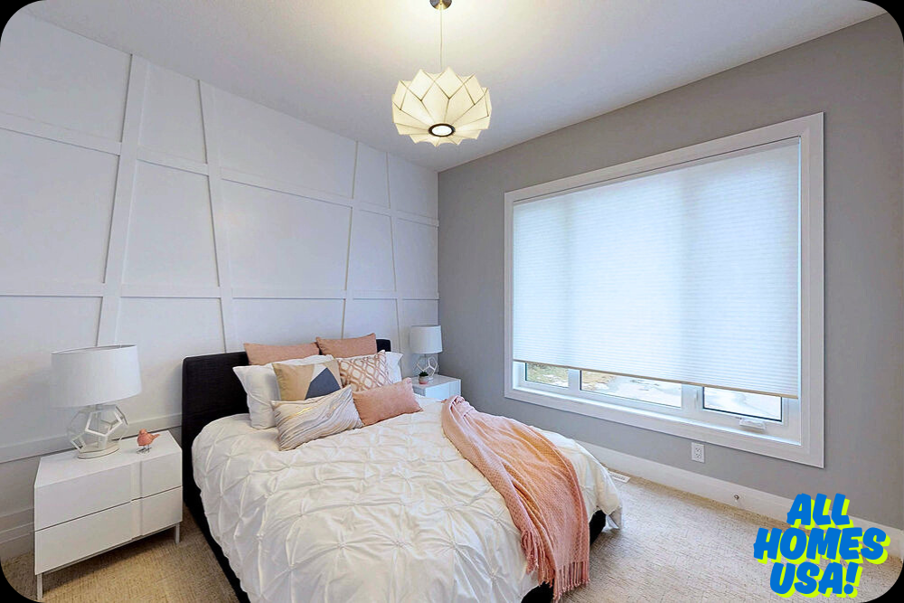 Modern bedroom with geometric wall panels, a neatly made bed with pink and gray pillows, soft lighting, and a large window with blinds. Cozy and serene. Image for illustrative purpose.