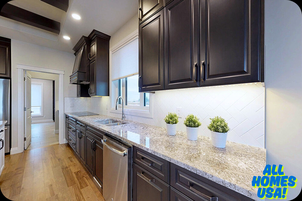 Sleek kitchen with dark wood cabinets, granite countertops, and stainless steel appliances. Potted plants add warmth. Bright and modern feel. Image for illustrative purpose.