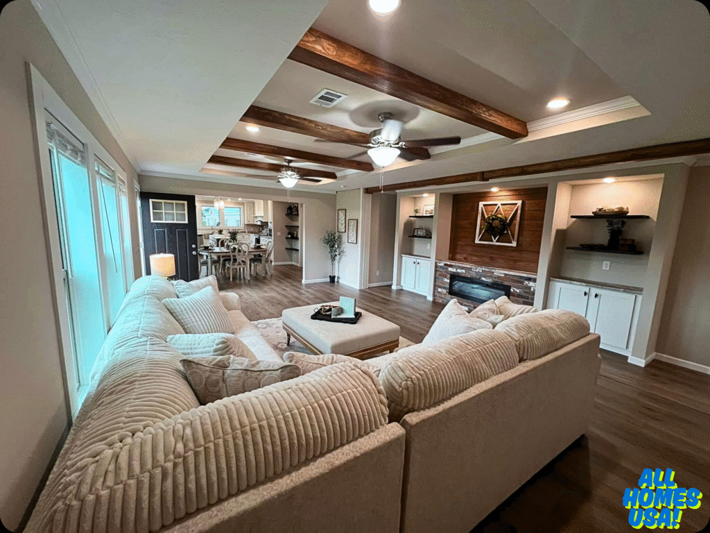 Spacious living room featuring a beige sectional sofa, wooden ceiling beams, and a central light fixture. Cozy ambiance with a modern, rustic style. Image for illustrative purposes.