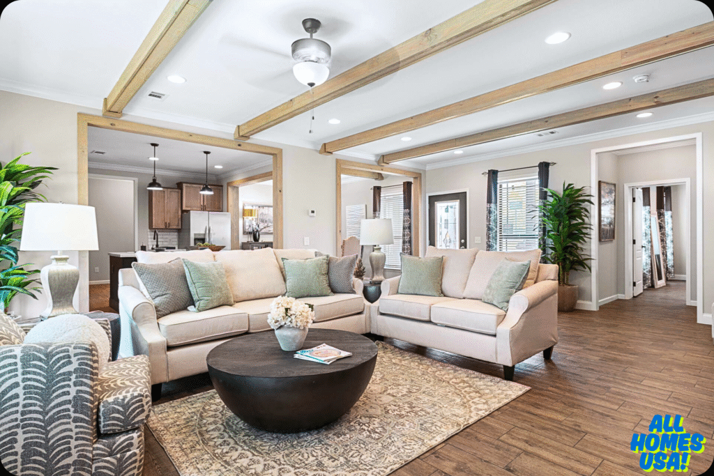 Stylish living room with beige sofas, green cushions, and modern decor. Wooden beams, large potted plants, and soft lighting create a cozy ambiance. Image for illustrative purpose.